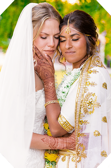 Expertly lit wedding portrait with sharp henna and jewelry detail.