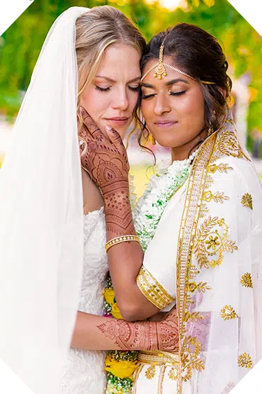 Expertly lit wedding portrait with sharp henna and jewelry detail.