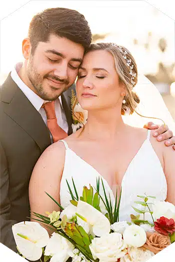 Golden hour wedding photography: Intimate bride and groom portrait.