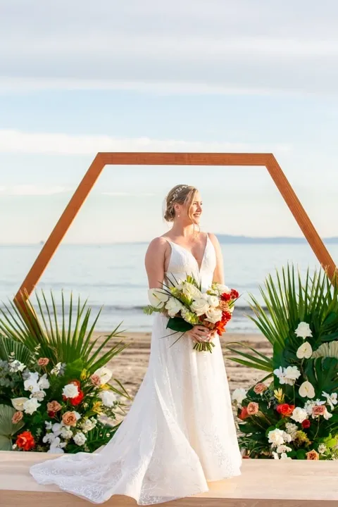 Oceanfront bride holding a wedding bouquet