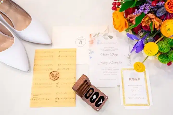 wedding invitation along with flowers