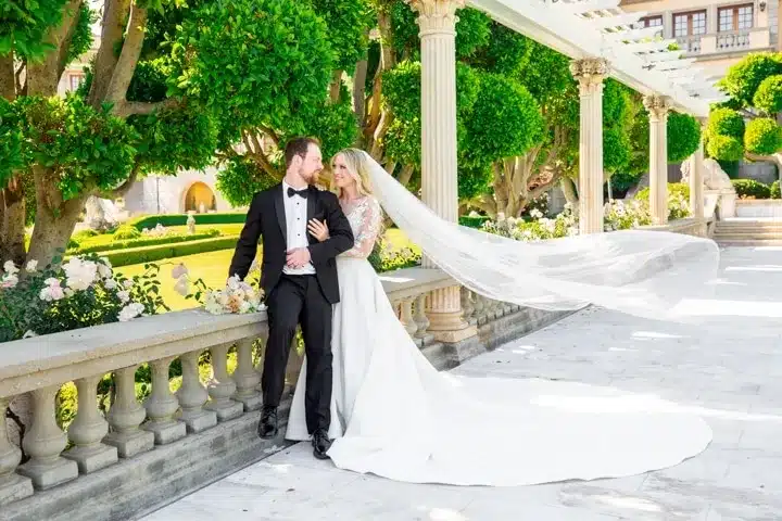 Elegant groom and bride outdoor photoshoot
