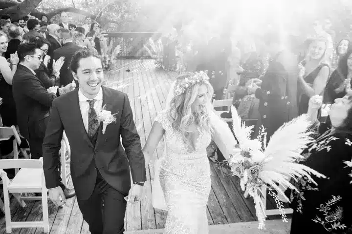 couple walks towards the stage